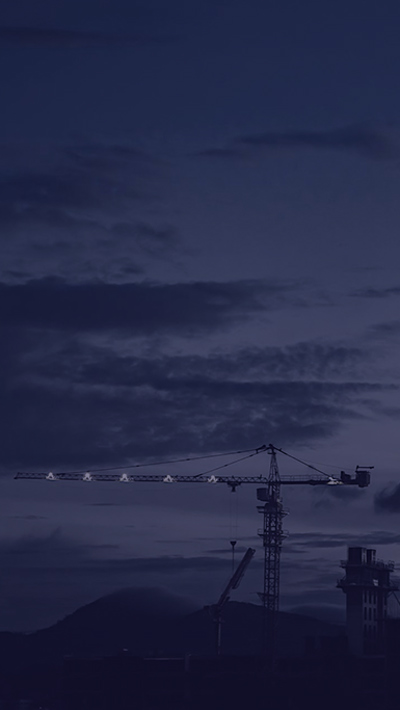 Construction Cranes At Night With Spiral 
